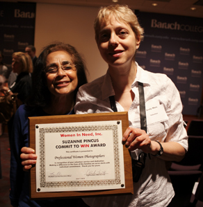 Andy Mars accepting award for Volunteer Group of the Year on behalf of PWP's Outreach Program from Women In Need