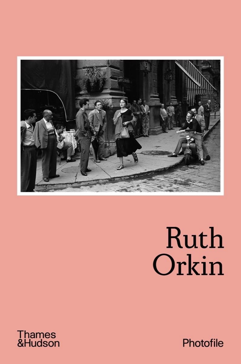 Cover of "Ruth Orkin (Photofile)" featuring a black-and-white street photo of a woman walking past a group of men, set against a salmon pink background.