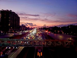 Sunset over a bridge with traffic